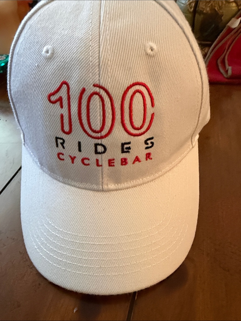 Cyclebar White Hat with Red Embroidered "100 Rides"